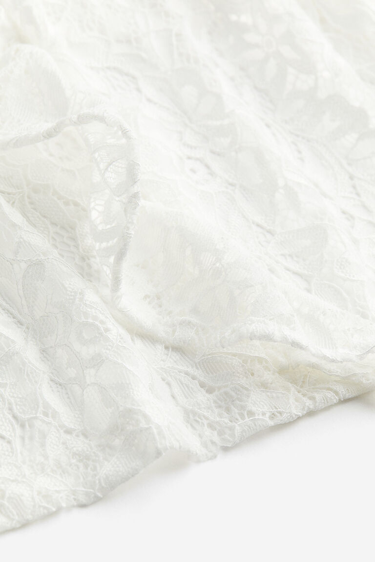 Frill-trimmed puff-sleeved lace top