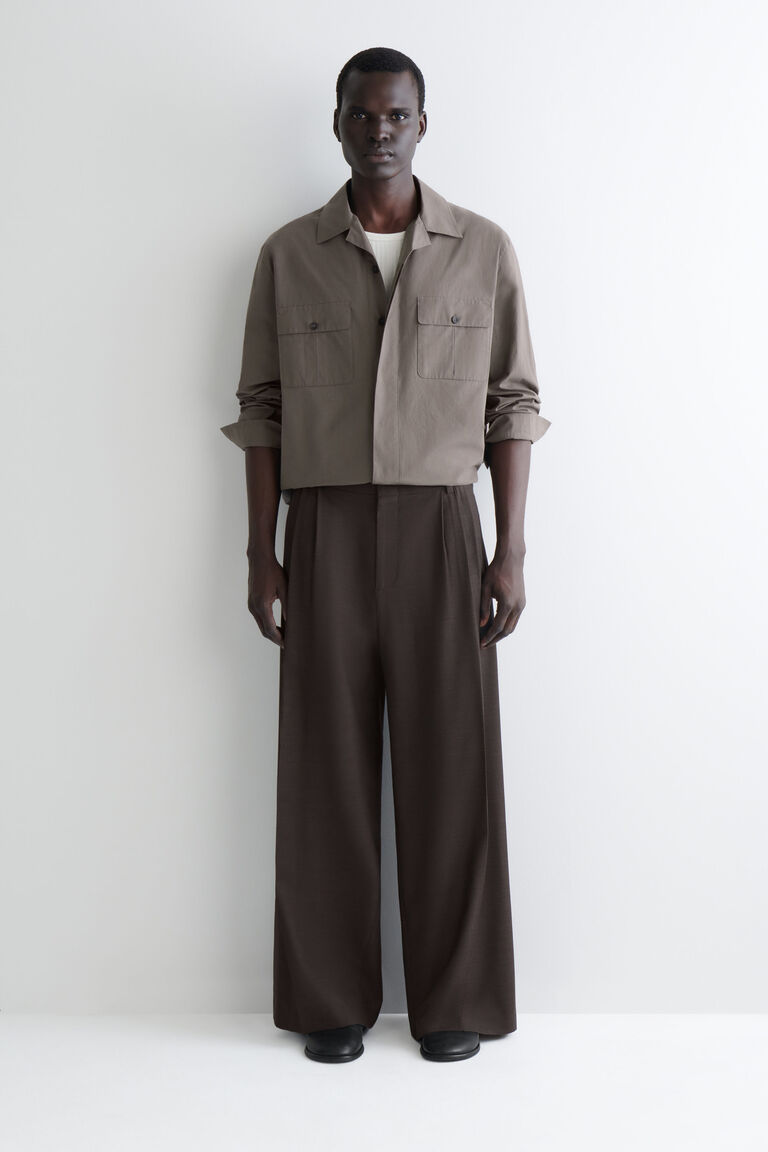 PLEATED WOOL WIDE-LEG TROUSERS