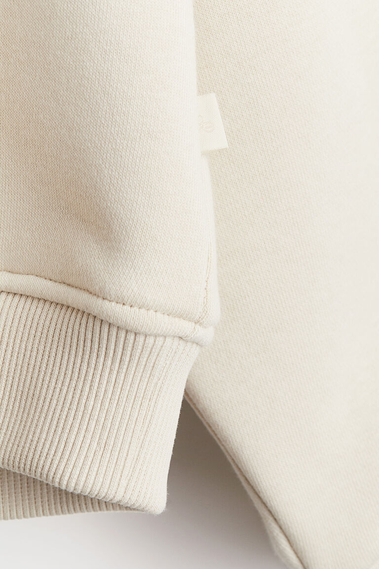 Oversized sports hoodie Men's Sportswear Online | H&M Thailand