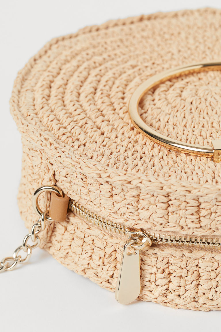 Round straw shoulder bag