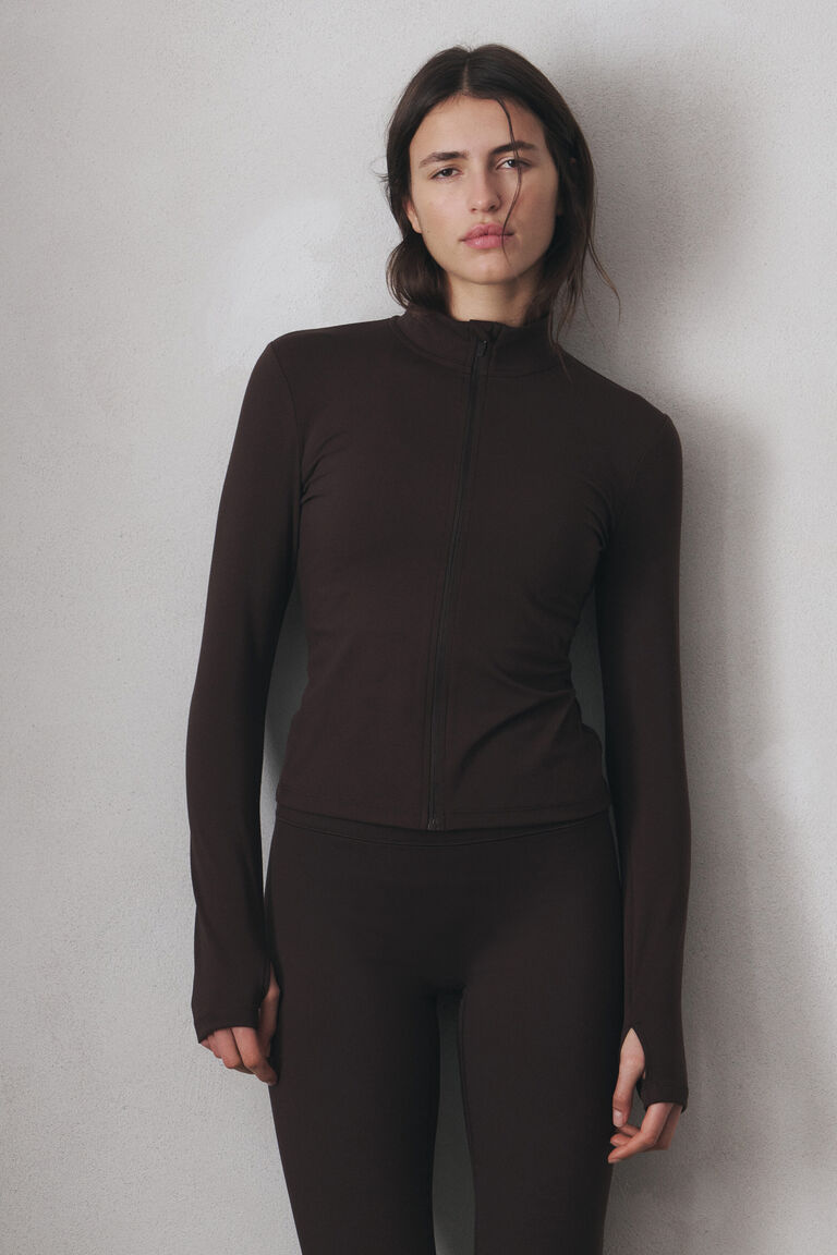 Zip-through sports jacket with SoftMove™