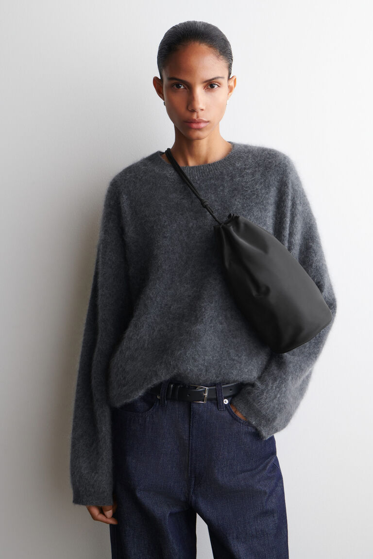 กระเป๋าสะพายข้างสายรูด - ไนลอน