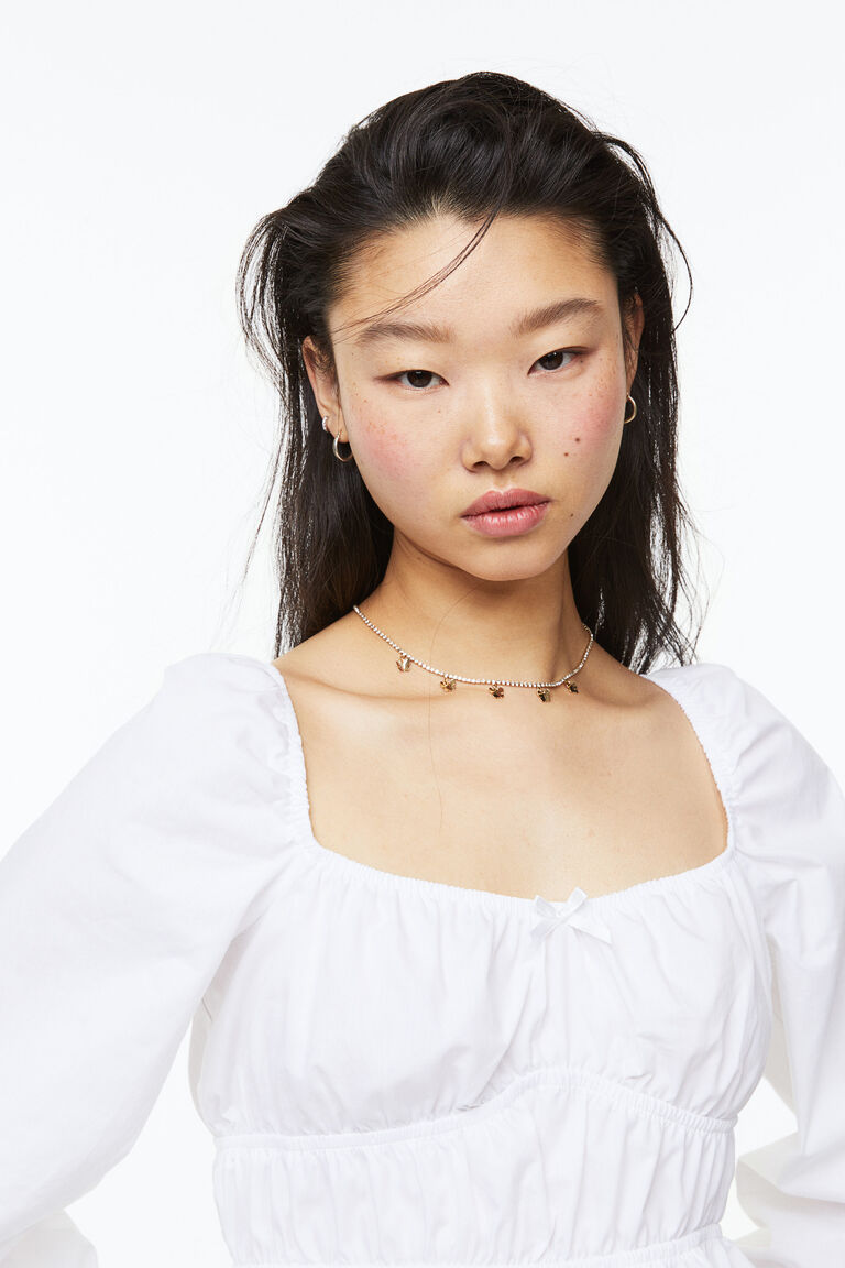 White Puff-Sleeve Cotton Peplum Blouse