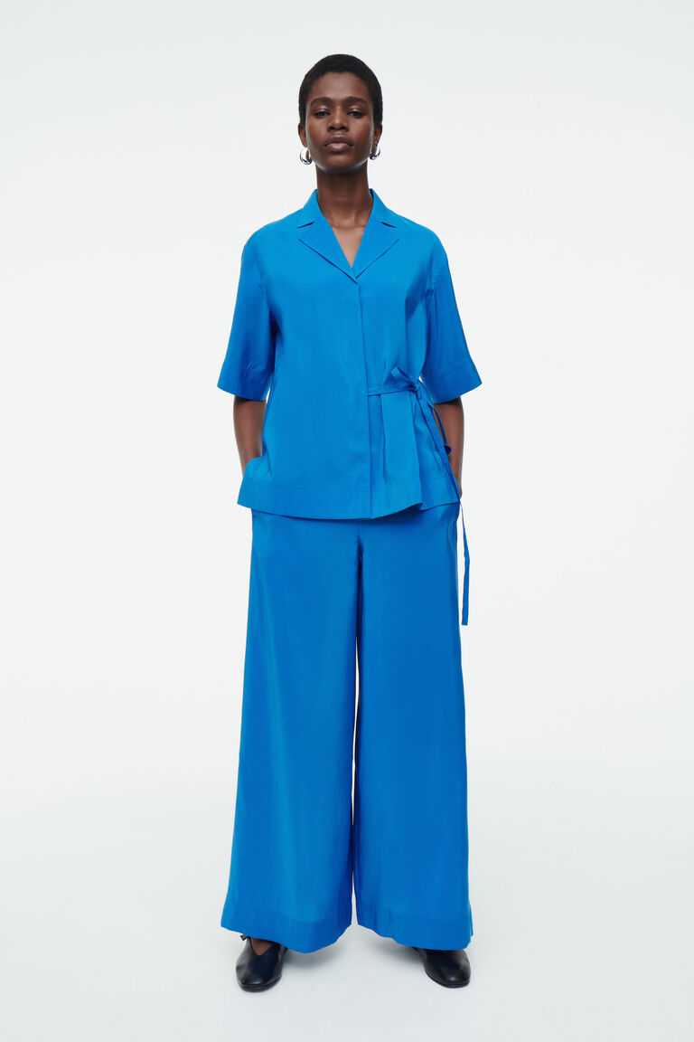 ELASTICATED WIDE-LEG TROUSERS