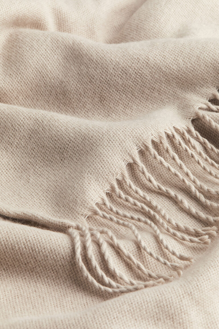 Fringe-trimmed poncho