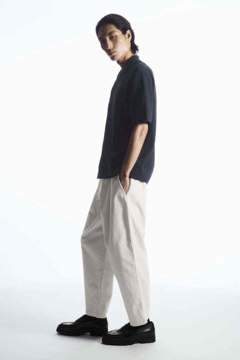 PLEATED WIDE-LEG ELASTICATED TROUSERS