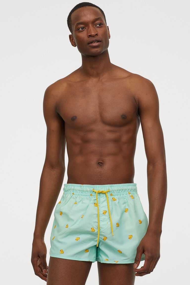 Short patterned swim shorts