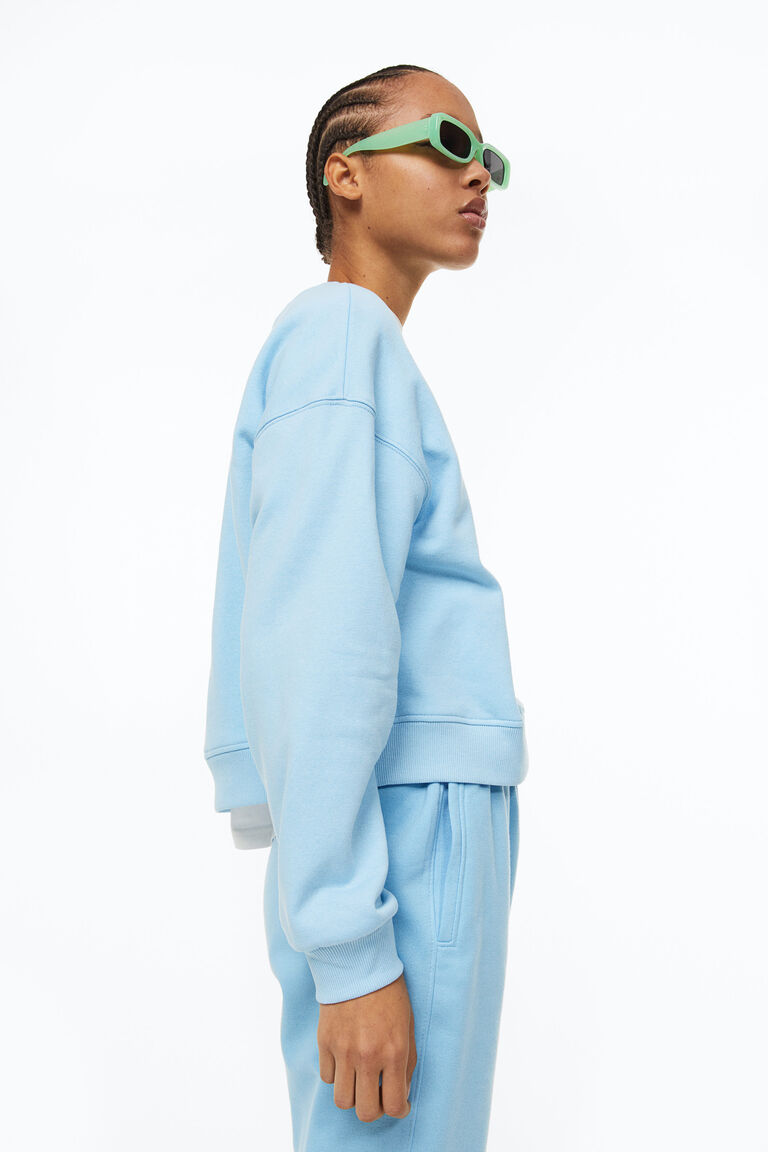 AM022161 LIGHT BLUE EMBROIDERY SWEATSHIRT