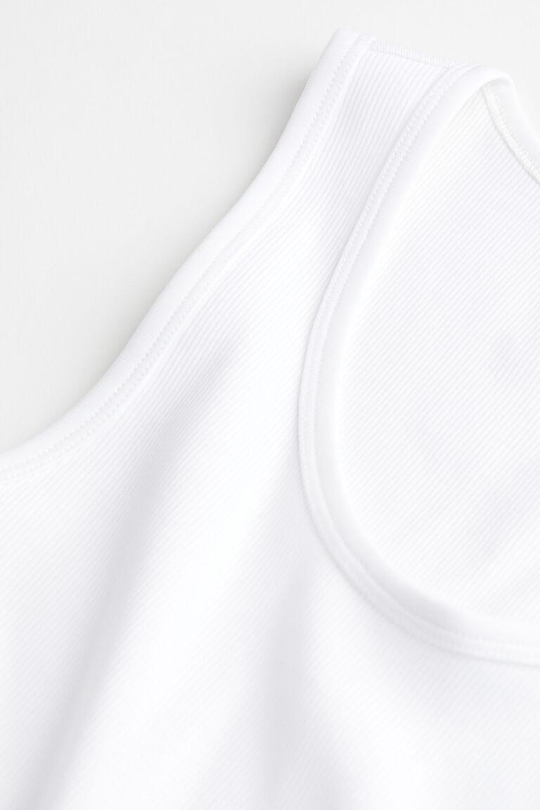 ASOS DESIGN - Canottiera Con Spalline Sottili Da Festival Decorata Con Piume Sintetiche