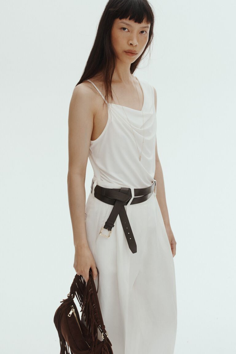 Draped asymmetric top