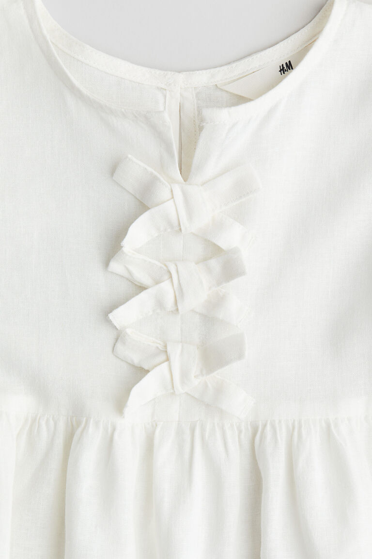 Bow-detail peplum blouse