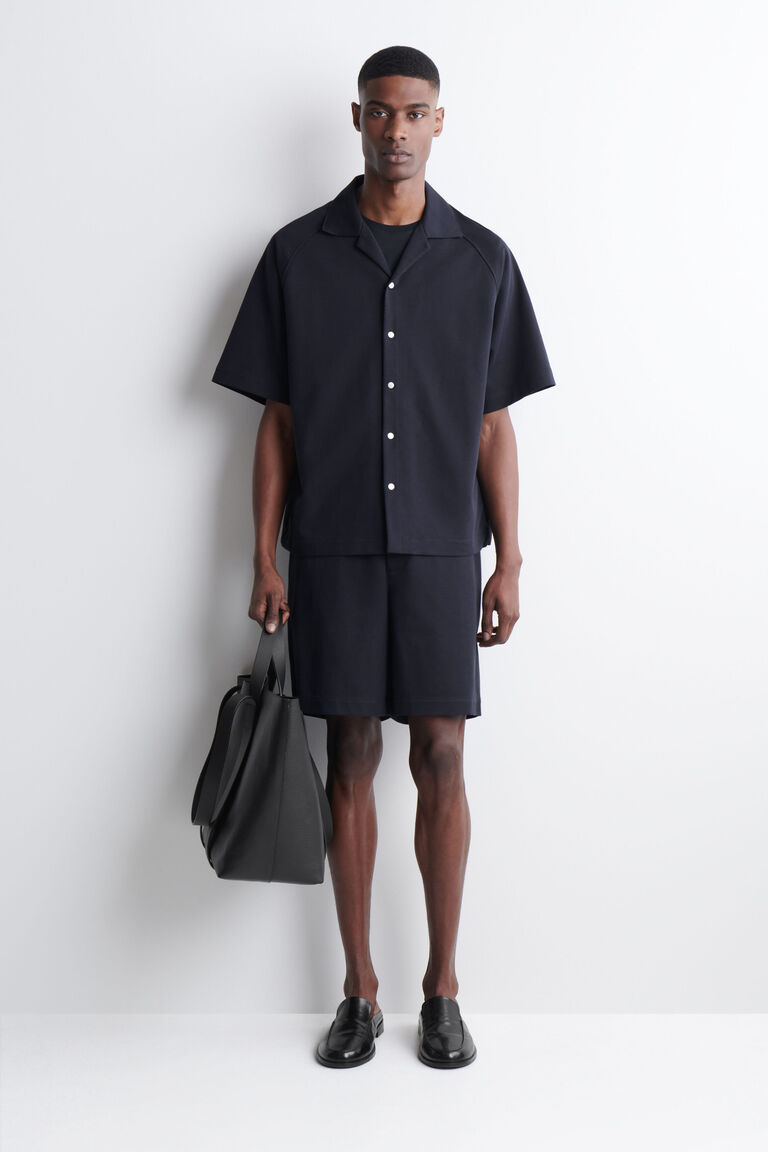 กางเกงขาสั้นผ้าจอร์ซีย์ดีไซน์แผงยืดหยุ่น