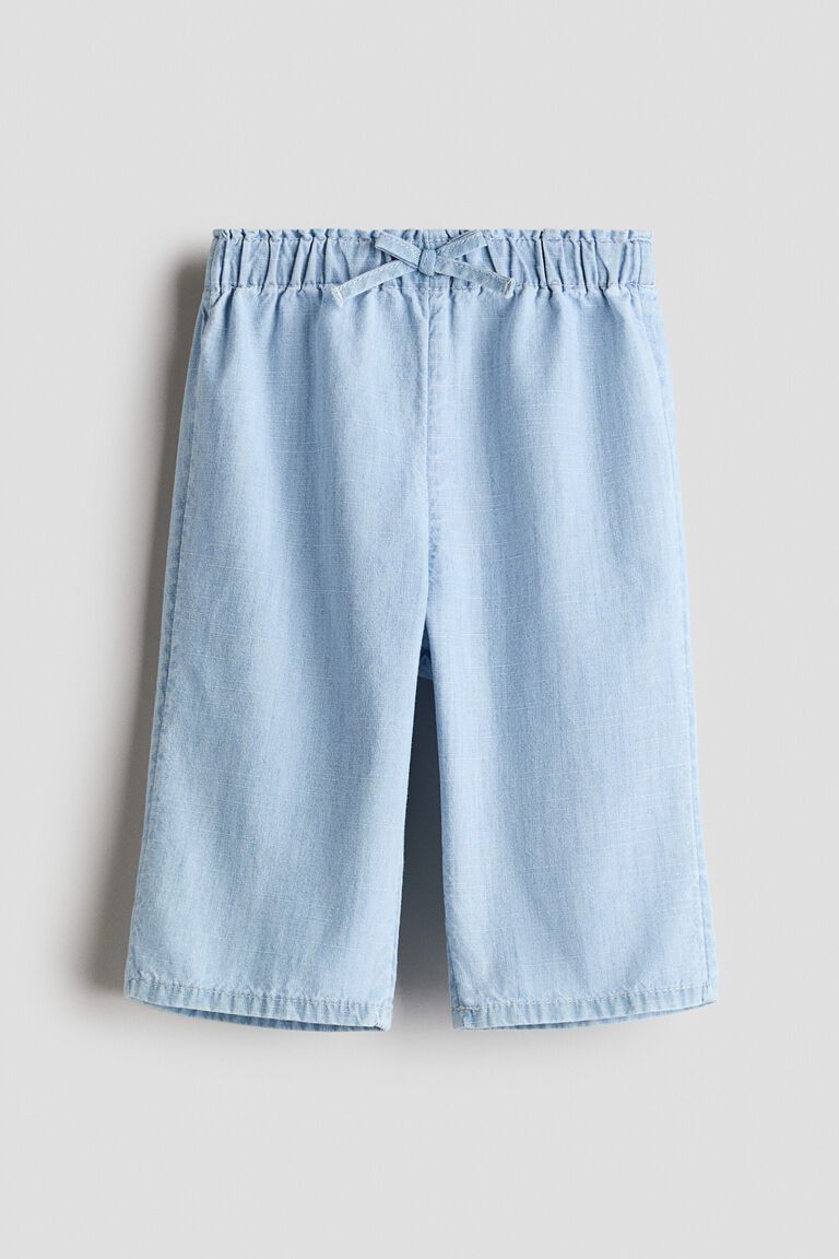Wide-leg denim trousers