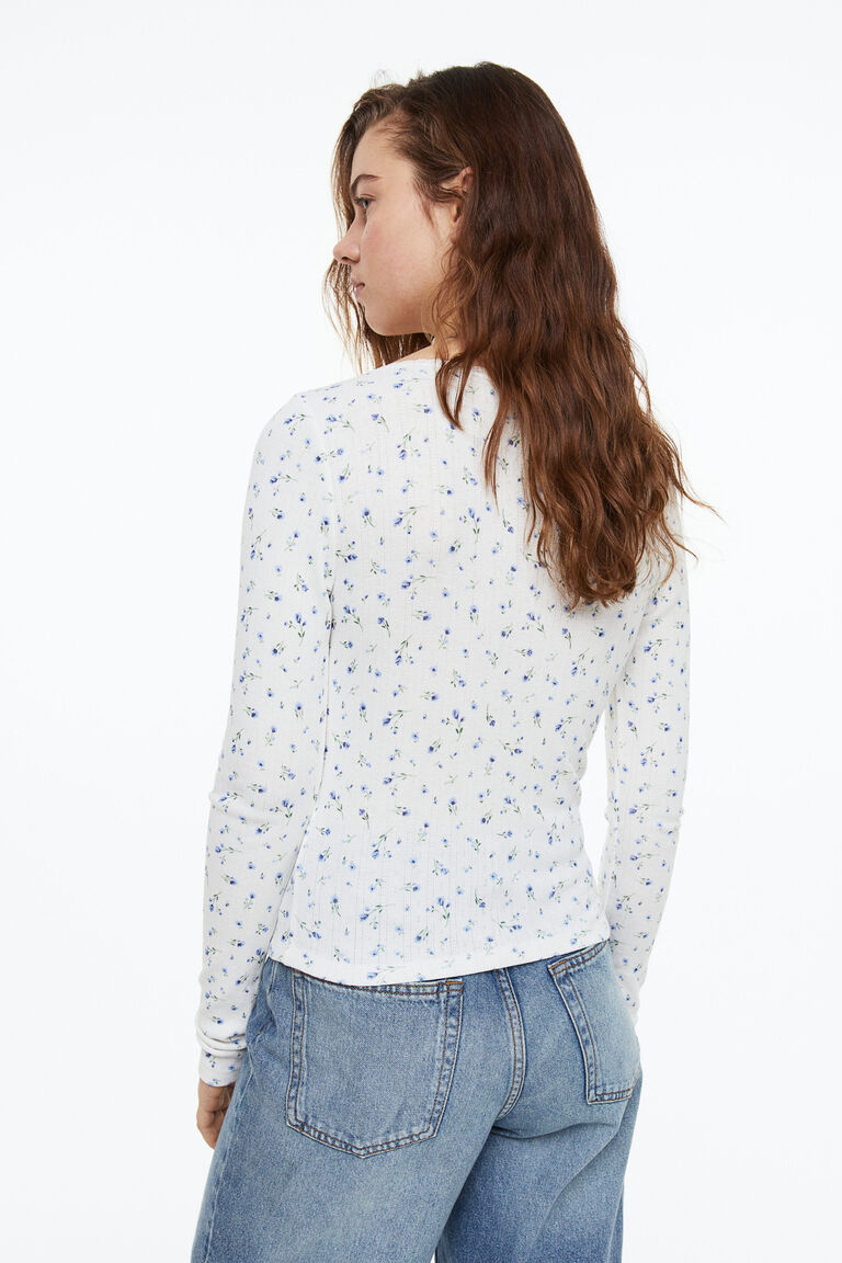 Lacetrimmed pointelle jersey top