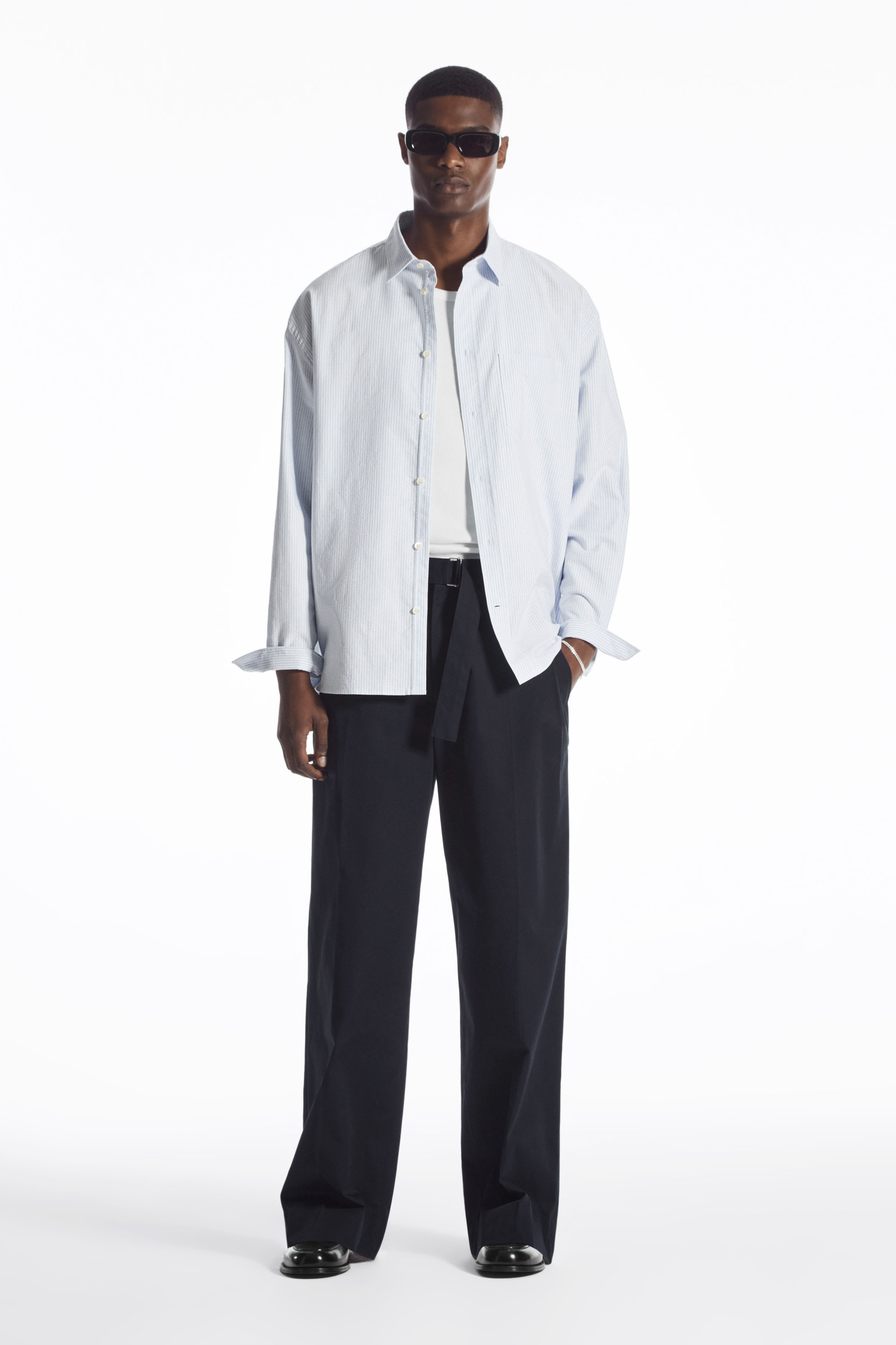 BELTED PLEATED WIDE-LEG TROUSERS