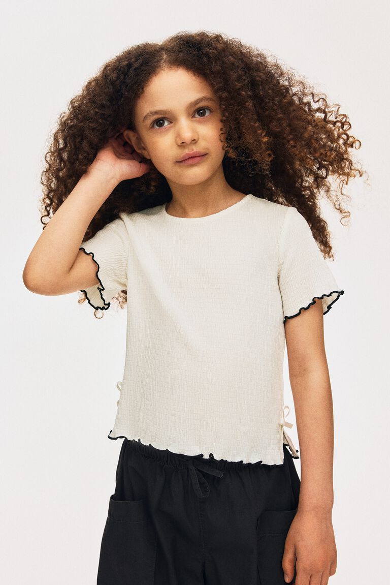 Bow-detail top
