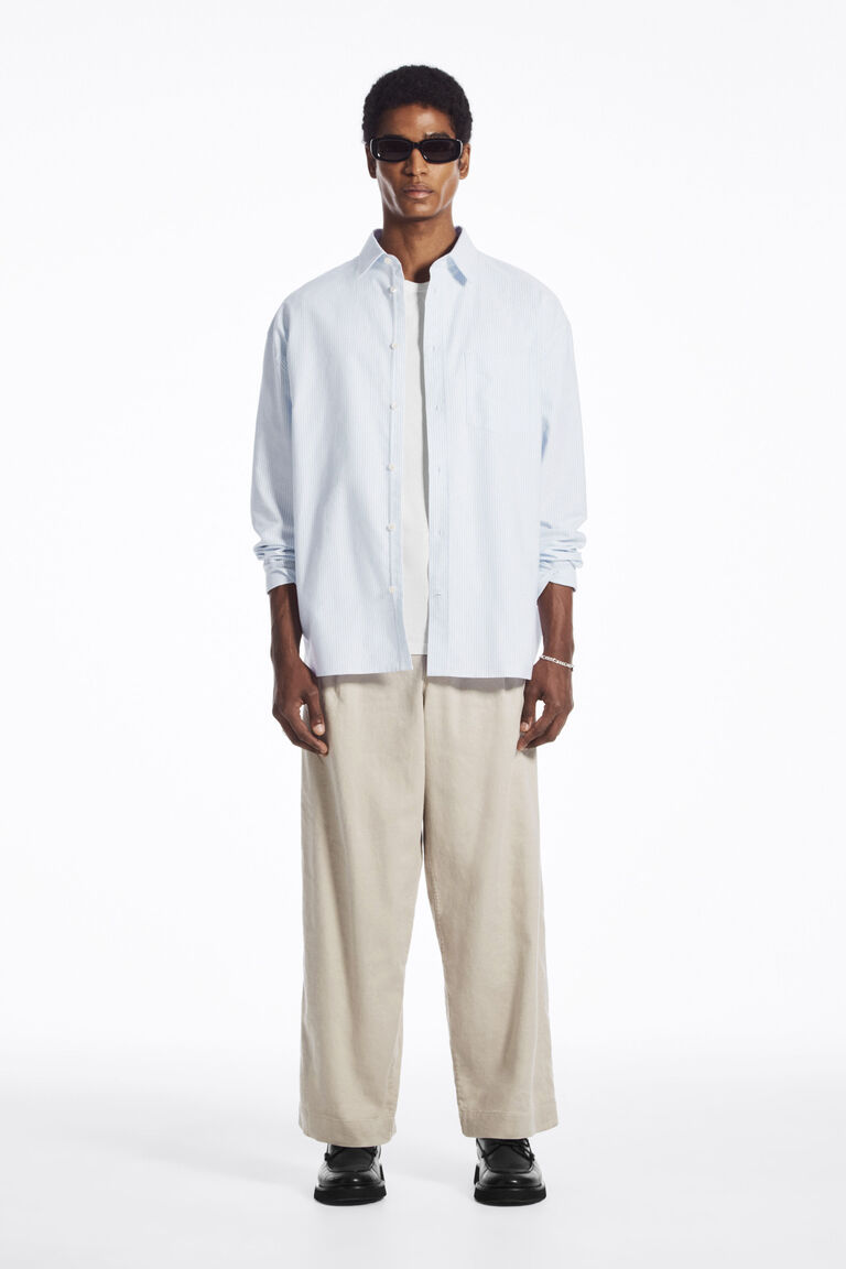 ELASTICATED WIDE-LEG LINEN TROUSERS