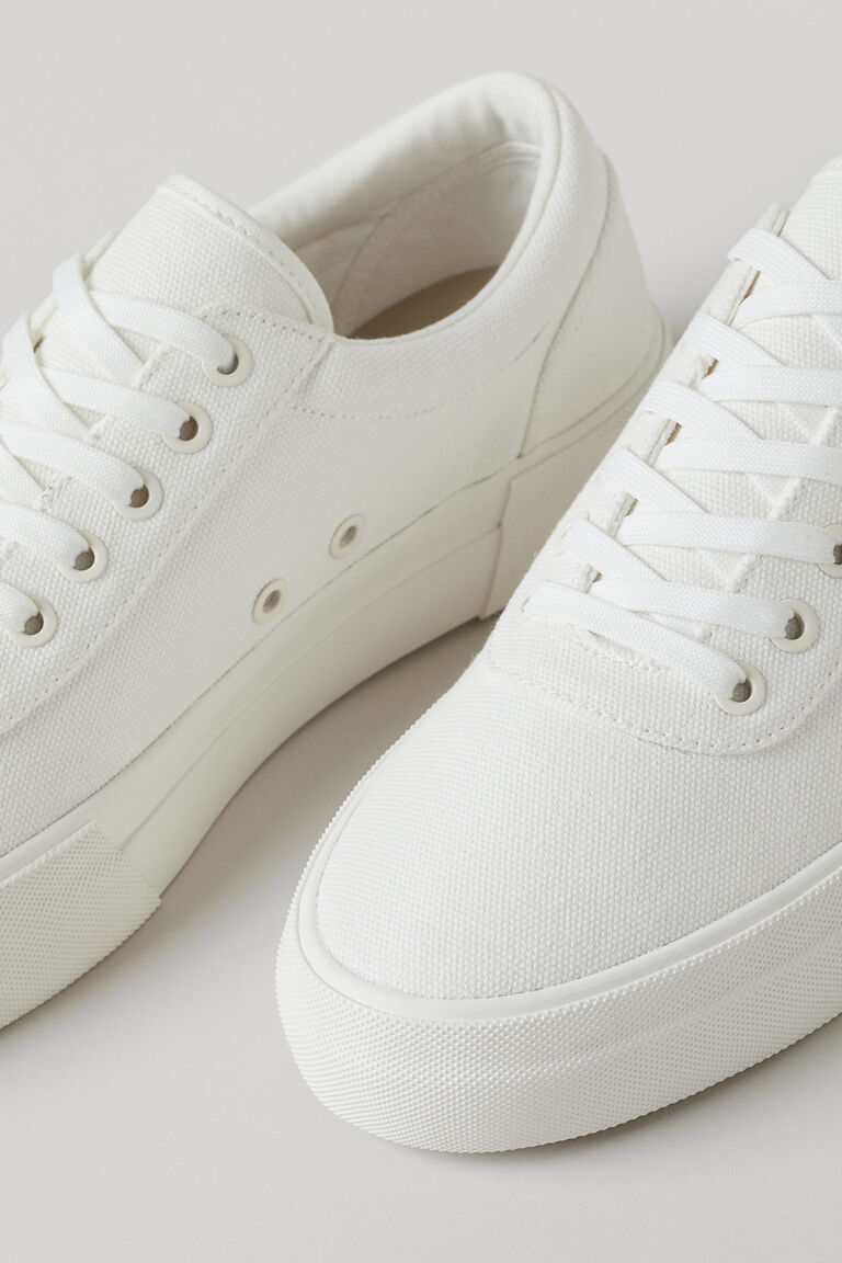 black and white canvas trainers