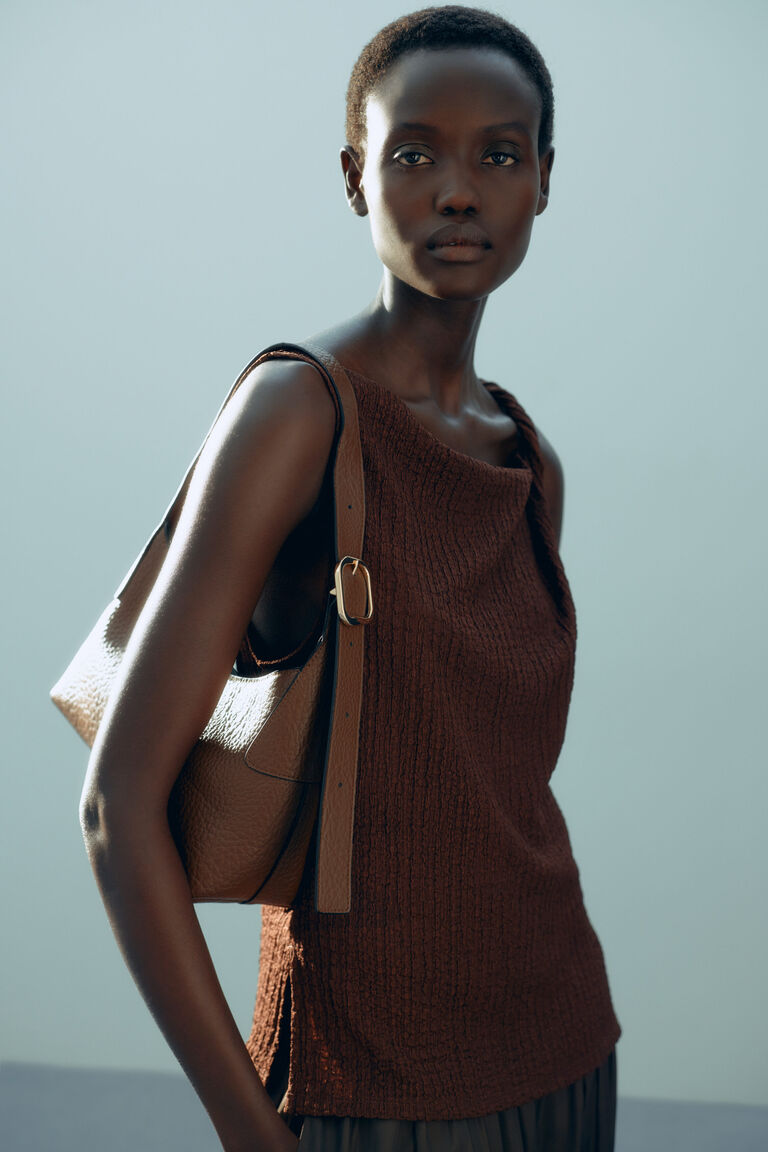 Twist-detail top