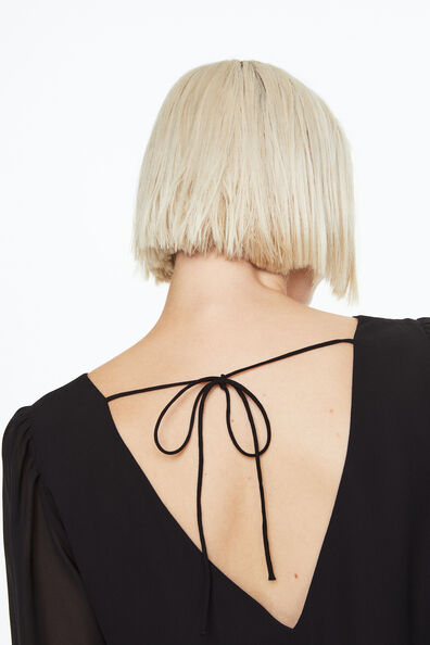 Balloon-sleeved peplum blouse