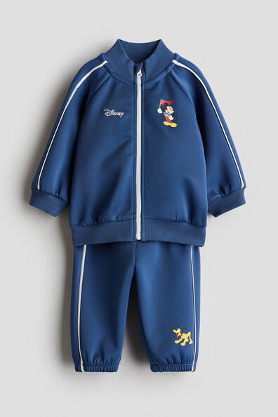 Motif-detail track suit