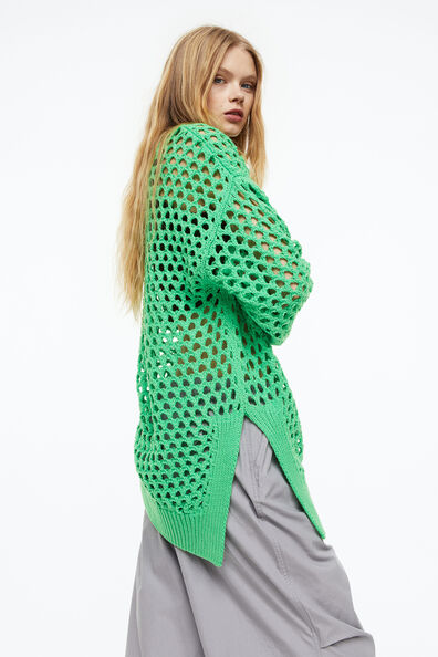 Asymmetric hole-knit jumper