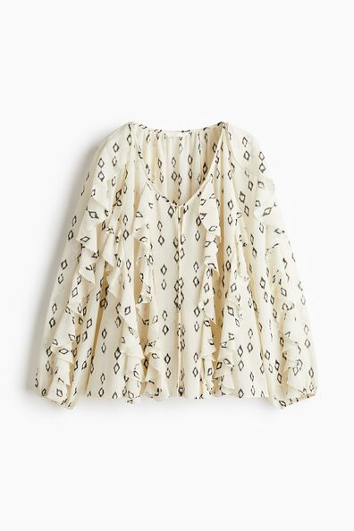 Flounce-trimmed blouse