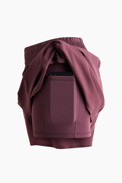 Layered sports shorts with pocket
