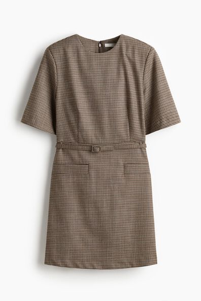 Belted shoulder-pad dress