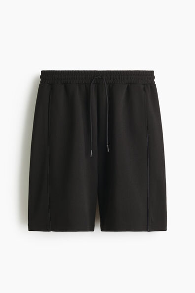 Loose Fit Sports shorts with DryMove™