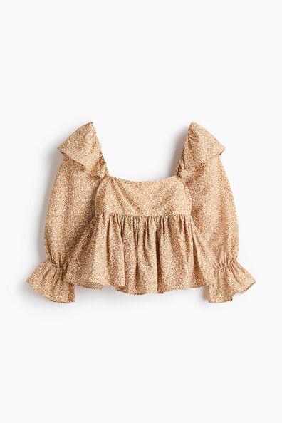Flounce-trimmed blouse