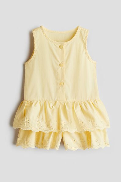 Flounced cotton romper suit