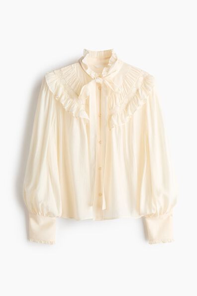 Frill-trimmed tie-neck blouse