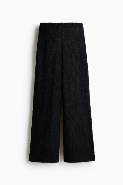 Wide crinkled trousers