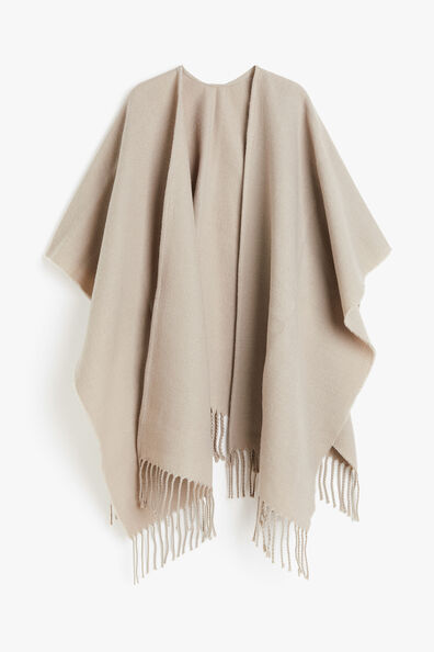 Fringe-trimmed poncho