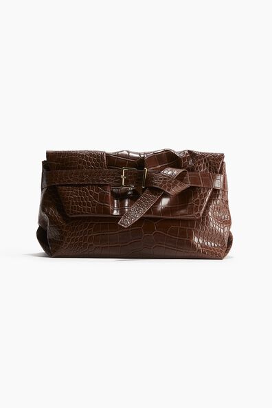 Strap-detail clutch