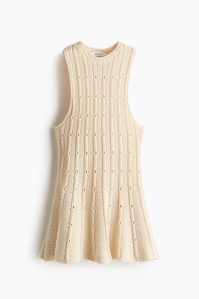 Pointelle-knit peplum top