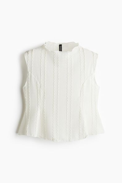 Textured peplum top