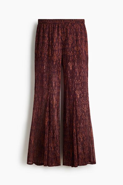 Flared crinkled trousers
