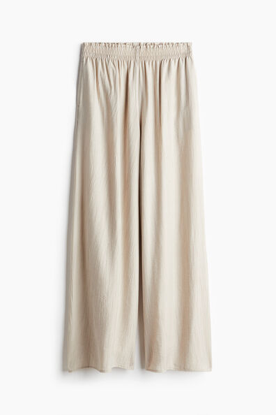 Wide crinkled trousers