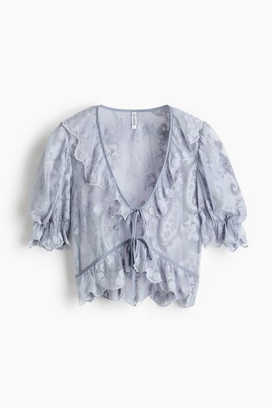 Embroidered flounced blouse