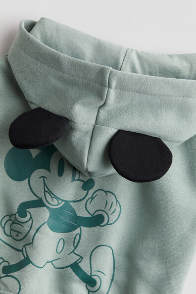 Embroidered-motif zip-through hoodie