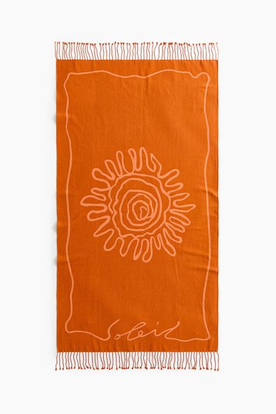 Fringed cotton beach towel