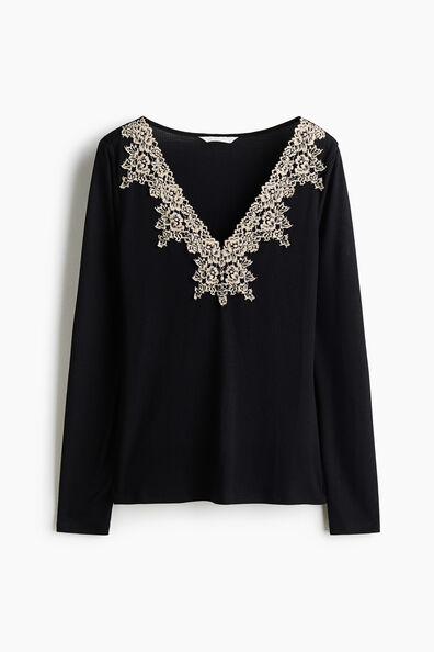 Lace-trimmed rib-knit top