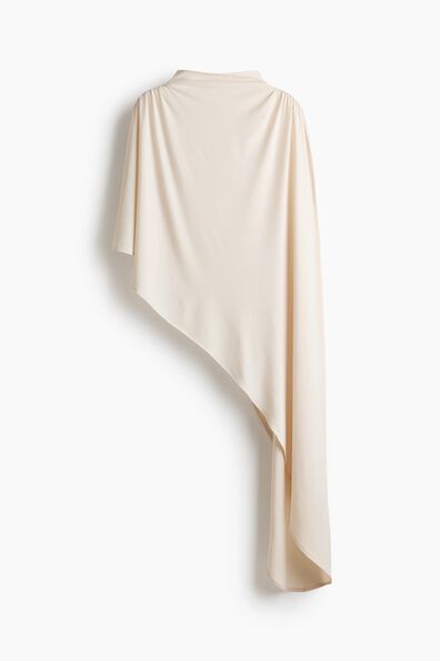 Asymmetric cape top