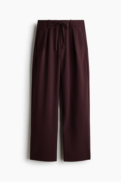 Pleated tie-belt trousers