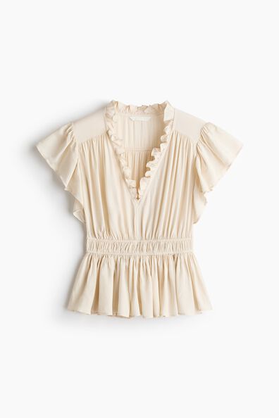 Flutter-sleeved peplum blouse