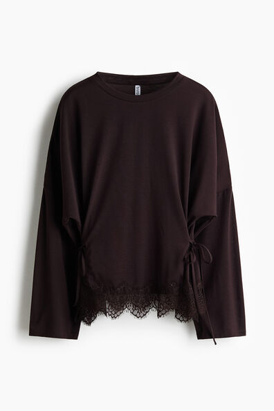 Lace-trimmed tie-detail top