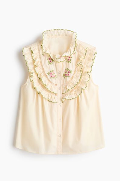 Embroidered frill-trimmed top