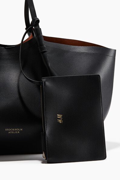 Shopper with pouch